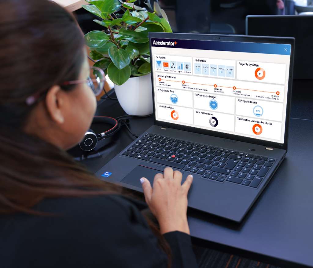 Woman using Microsoft Wellingtone Accelerator+ on a laptop.